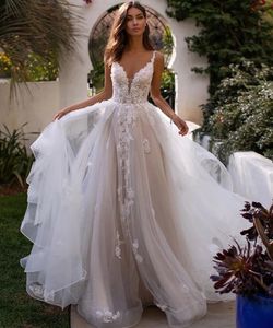 Plage Sexy dos ouvert Robe De mariée chapelle Train a-ligne sans manches col en V dentelle avec appliques 2023 robes De mariée Robe De Mariage