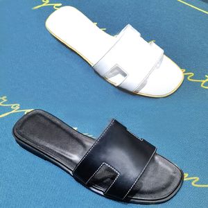 Strandslippers Klassiek Platte hak Zomer Lui Designer schoen Cartoon Big Head flops leer dame Slides damesschoenen Hotel Bad Dames sexy Sandalen maat 35-41-42 Met doos