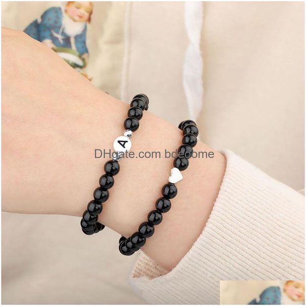 Cuentas de cuentas de vidrio negro de 6 mm con cuentas Pulsera para mujeres Hombres Hecho a mano Elástico Acrílico Letra Plana Grano Charm Pulseras colgantes Madres Dhgh9