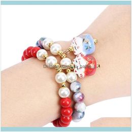 Bracelets perlés Bijoux brins de perles cadeau Bracelet obsidienne chat chanceux mignon femmes perles naturelles en céramique Femela1 livraison directe 202304D