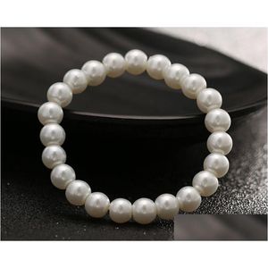 Moda con cuentas Joyería de mujer Perlas artificiales Pulsera Hebras Puro Blanco Perla de imitación Venta al por mayor Envío de entrega de gota Pulseras DHVP3