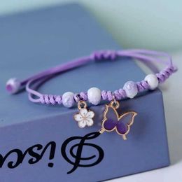 Bracelet de fleur de papillon violet à la main Rinhoo perlé bracelet pour les femmes