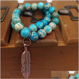 Perlé St0188 10 mm extensible véritable bracelet en régalite bleue serti de breloques en plumes de cuivre perles de jaspe impérial livraison directe juif Dhgarden Dhmoa