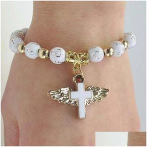 Bracelets de chapelet de croix d'aile d'ange exquise brin de perles bronzant acrylique baptême extensible pour femmes filles cadeau livraison directe bijoux Dhpmj