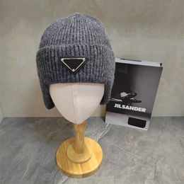 Bonnet chapeaux et femmes hommes automne/hiver tricot créateur de mode chapeau thermique marque de Ski Bonnet haute qualité Protection des oreilles Wa