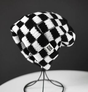 Bonnet Skull Caps version coréenne marque à la mode étiquette en tissu chapeau tricoté pour hommes hiver chaud damier plaid froid femmes s coupe ample sm 231117