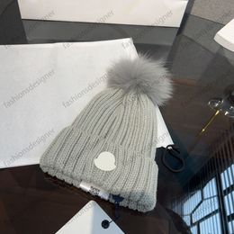 Bonnet avec Pom Pom designer beanie hommes monclair chapeau bonnet en tricot lourd pour les femmes chapeau en tricot côtelé avec une fausse fourrure pom pom casquette bonnet bonnets