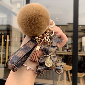 Women's Plush Pompom Keychain with Classic Checkerboard Pattern and Metal Buckle Ring for Car Keys