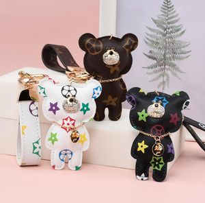 Motif d'impression d'ours Porte-clés en cuir PU Porte-clés pour animaux Accessoires de voiture Sac Porte-clés Longe Clé Portefeuille Chaîne Corde Chaîne ensemble En Gros