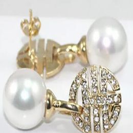 Beau bijoux énorme 12 mm rond de boucle d'oreille de perle de coquille