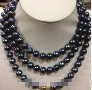 Beau collier de perles de Tahiti noires naturelles de 8 à 9 mm, fermoir en or 14 carats de 50 pouces