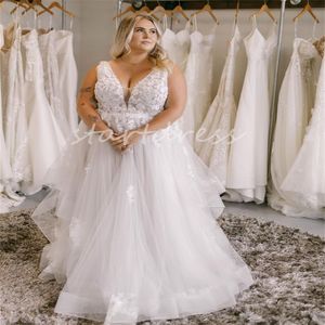 Mooie Plus Size Boho Trouwjurk 2024 Sexy V-hals Bloemen Kant Strand Bruidsjurk Ruglooze Tule Grote Vloerlengte Zwierige Bruidsjurk Elegante Vestios Novias