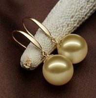 Belle mer du Sud une paire de bretelles de perles de 10-11mm or 14k or
