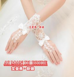 Mooie witte pure vingerloze kant bruiloft bruidshandschoenen jurk bal handschoen trouwjurk accessoires nieuwe collectie9889901