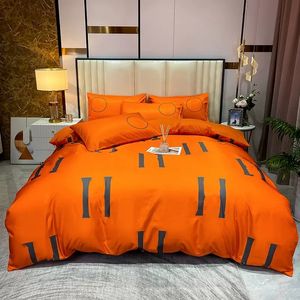 Literie orange haut de gamme en soie en soie légère luxe luxe nue nue drap en soie et couette ensemble quatre ensembles contactez-nous pour voir les photos avec le logo