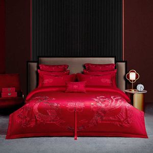 Beddengoed sets Chinese bruiloftsdragon Phoenix vierdelige set 100% katoenen laken en quiltbedekking Big rood bruiloft beddengoed linnen