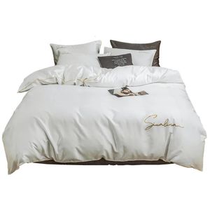 Ensembles de literie Literie quatre pièces simple coton double drap de lit domestique housse de couette passepoil brodé confortable couleur blanche 231211