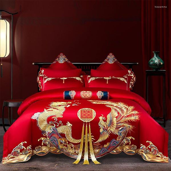 Conjuntos de ropa de cama Juego de funda nórdica con bordado de Fénix, borla dorada, boda china de lujo, sábanas de algodón rojo, fundas de almohada