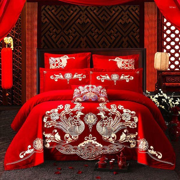 Conjuntos de ropa de cama Conjunto de bordado de Phoenix de lujo Boda real china Princesa de algodón rojo Edredón / Funda de edredón Sábana de cama Fundas de almohada