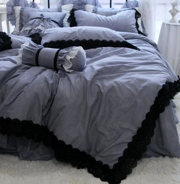 Juegos de ropa de cama Producto de lujo Estilo minimalista europeo y americano Encaje negro Guapo Falda de cama totalmente de algodón Funda nórdica Ropa de cama.