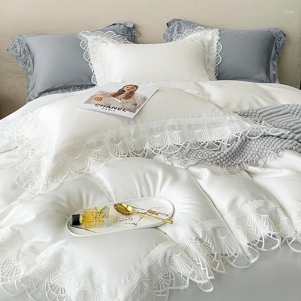 Ensembles de literie fibre de Lyocell naturel doux soyeux couleur Pure princesse ensemble blanc dentelle bord lisse housse de couette drap de lit taies d'oreiller