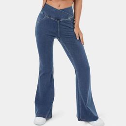 Jeans à fond de cloche pour femmes hautes taille extensible jeans jeans croix traction sur un pantalon de fusée de contrôle du ventre avec des poches