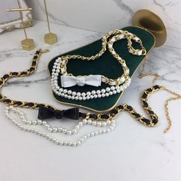 Cinture Cintura di moda e lusso Catena classica in pelle di marca per donna Fiore Diamanti Perline Perle Telai Pelle di pecora nera240Z