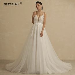 Bepeithy Deep V Neck Spaghetti Straps a Line Lace Wedding Vestidos para mujeres Glittler sin mangas boho brotación de fiesta de novia 240321