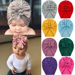 Boinas 30 unids Precio al por mayor a granel Algodón suave Atado Arco de pelo Turbante Caps para niñas Elástico Head Wear Kids Headwrap Boutiques Accesorios