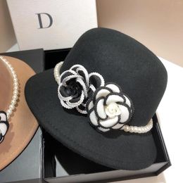 Bérets français petit parfum perle fleur laine pot chapeau à la mode rétro européen et américain Hepburn célébrité japonaise polyvalente