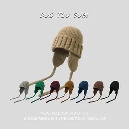 Baretten Ins Koreaanse versie Effen kleur Gehoorbescherming Gebreide mutsen voor dames Herfst en winter Warm Veelzijdig Retro Band Bomber Cap