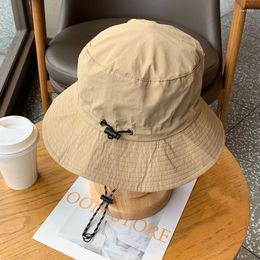 Boinas verano Color sólido impermeable cubo sombreros mujeres al aire libre ajustable secado rápido pescador sombrero para hombres Anti Uv Panamá gorra