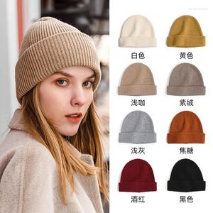 Boinas Gorro de lana Gorro de invierno Tejido para mujer Moda Cálida Versión coreana de la capucha Otoño y venta al por mayor