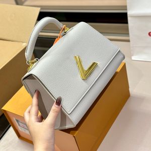 Bolso de diseñador de la mejor calidad Mujer Hombro Lady Twist Clutch Diseño clásico Grace Colores lisos Cuero de vaca suave Louies Bolso Tendencia Marca Mango Monedero Bolsas