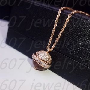 Meilleur vendeur collier de créateur pour femmes brillant pendentif rotatif incrusté de rubis collier mode conception frontale fête petite amie cadeau