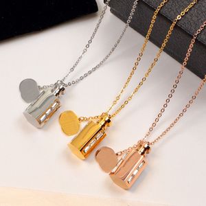 Best verkopende parfumfles heren hanglagers ketting vrouwen koppelen kettingen 3 kleur gouden lange ketting modevoorziening groothandel roestvrijstalen sieraden