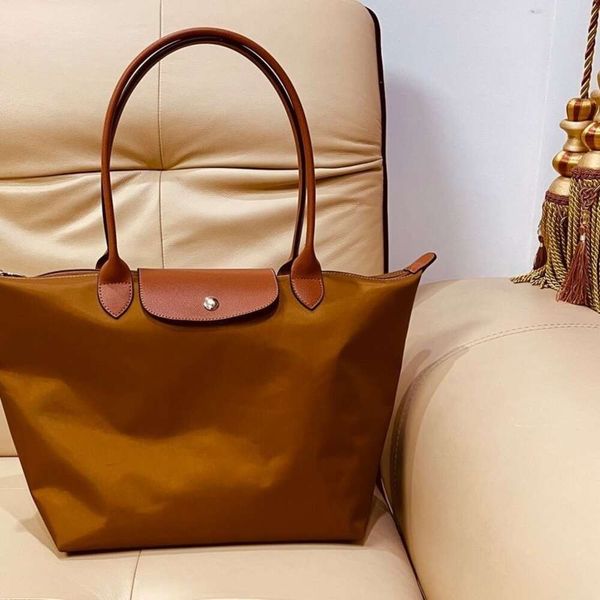 Sac à épaule mieux vendu nouveau 90% Ventes directes Small Produit grand produit grand manche en nylon à longue manche en nylon capacité maman fourrelle légère voyage un sac carré