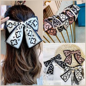 Big Bowknot Hairpin Four Leave Clover Pinzas para el cabello Barrettes Temperament Clip Crystal INS Personalidad High-end Hairs Jewelry Tocado Accesorios