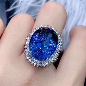 Gran Oval 7 azul cristal zafiro Topacio piedras preciosas anillos de diamantes para mujeres oro blanco plata Color fiesta joyería Bague regalo