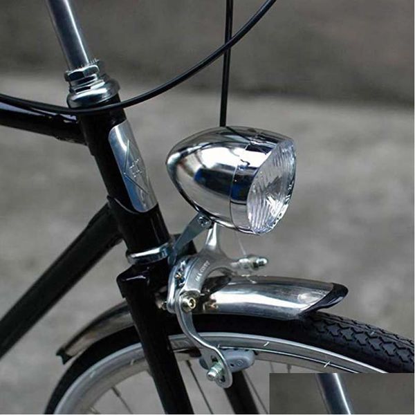 Lumières de vélo Durable LED Métal Chrome Rétro Vélo Vélo Avant Antibrouillard Lampe Frontale Accessoires De Cyclisme Lumières Drop Livraison Sports Outd Dhhvq