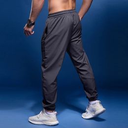 Bintuoshi Sport Pantalons Hommes coulant avec des poches à fermeture éclair et un pantalon de sport