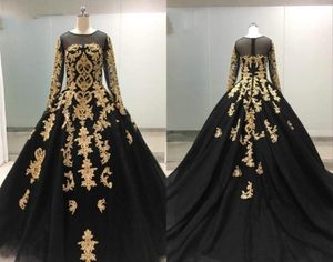 Robes de bal de robe de bal en dentelle noire et or avec paillettes à manches longues en tulle