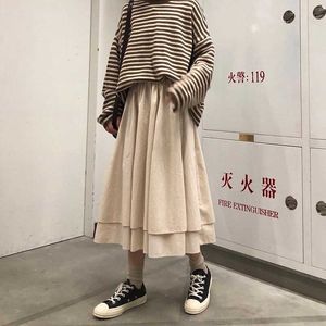 Zwarte beige Koreaanse veer hoge taille lange rokken stevige kleur een lijn onregelmatige trapsgewijze rokken dames vrouwelijk elegante streetwear 210619