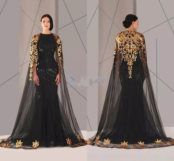 Robe de soirée noire en tulle et encolure bateau musulmane paillettes d'or noir