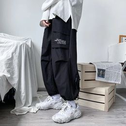 Zwarte cargobroek heren hiphop streetwear mode jogger harembroek man casual joggingbroek mannelijke broek groot formaat 5xl 240112
