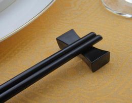 Chopstick de color negro Rest Chino Chopsticks con forma de almohada en forma de restaurante Rackware de la casa Rattle Rack5992705