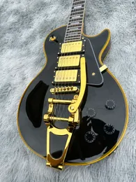 Guitarra eléctrica personalizada negra, logotipo amarillo y encuadernación del cuerpo, vibrato dorado, accesorios dorados, envío rápido