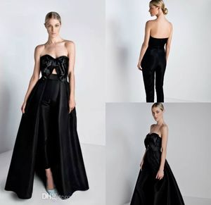 Zwarte jumpsuits prom dresses met afneembare trein boog strapless nek formele jurk avondjurken satijnen overkirt vrouwen broekjes
