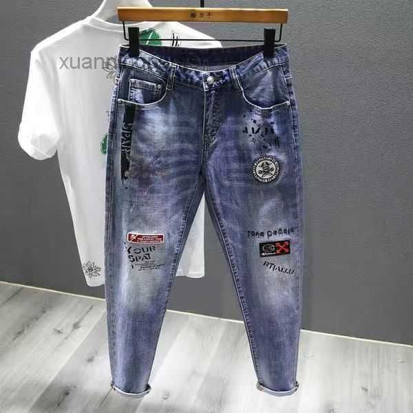 Pantalon noir Noir Gris Broderie Jeans déchirés Personnalité Homme Bump Couleur Splash Peinture Rétro Version Coréenne Montrer Les Pieds Élastiques Minces Longs IS6R