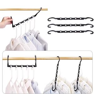 Zwarte plastic magische hangers vijf holes kast organisator hangers verstelbare kast opslagruimte kast organisatoren en opslagbesparende hangers voor thuis